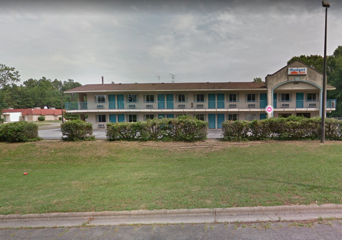 High Point police say a suspect ran into the hotel room of a complete stranger and hid in the bathroom, refusing to come out.