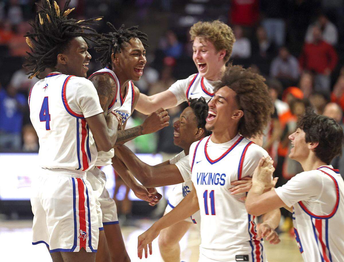 The North Meck Vikings celebrate their 57-47 victory over New Hanover to win the NCHSAA 4A State Championship on Saturday, March 16, 2024 at Lawrence Joel Veterans Memorial Coliseum in Winston-Salem, NC.