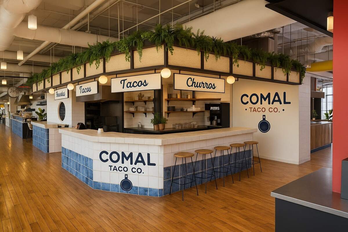 An eye-level, wide rendering of the “COMAL TACO CO.” food stall. A U-shaped counter, tiled with a blue and white pattern and the company logo, wraps around the service area, with several wooden stools lined up for seating. Above the counter, hanging signs read “Tacos” and “Churros,” with greenery decorating the top canopy.