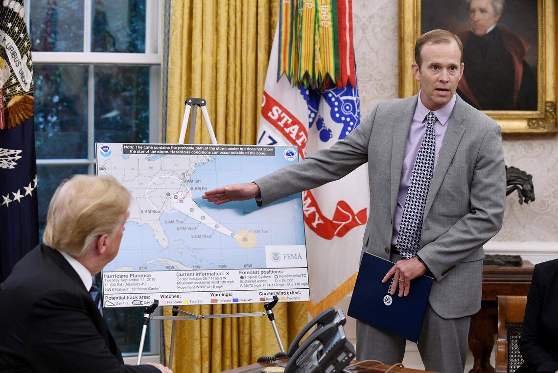 Federal Emergency Management Agency Administrator Brock Long, right, briefs U.S. President Donald Trump on the looming threat of Hurricane Florence in the Oval Office of the White House Tuesday, Sept. 11, 2018, in Washington, D.C.