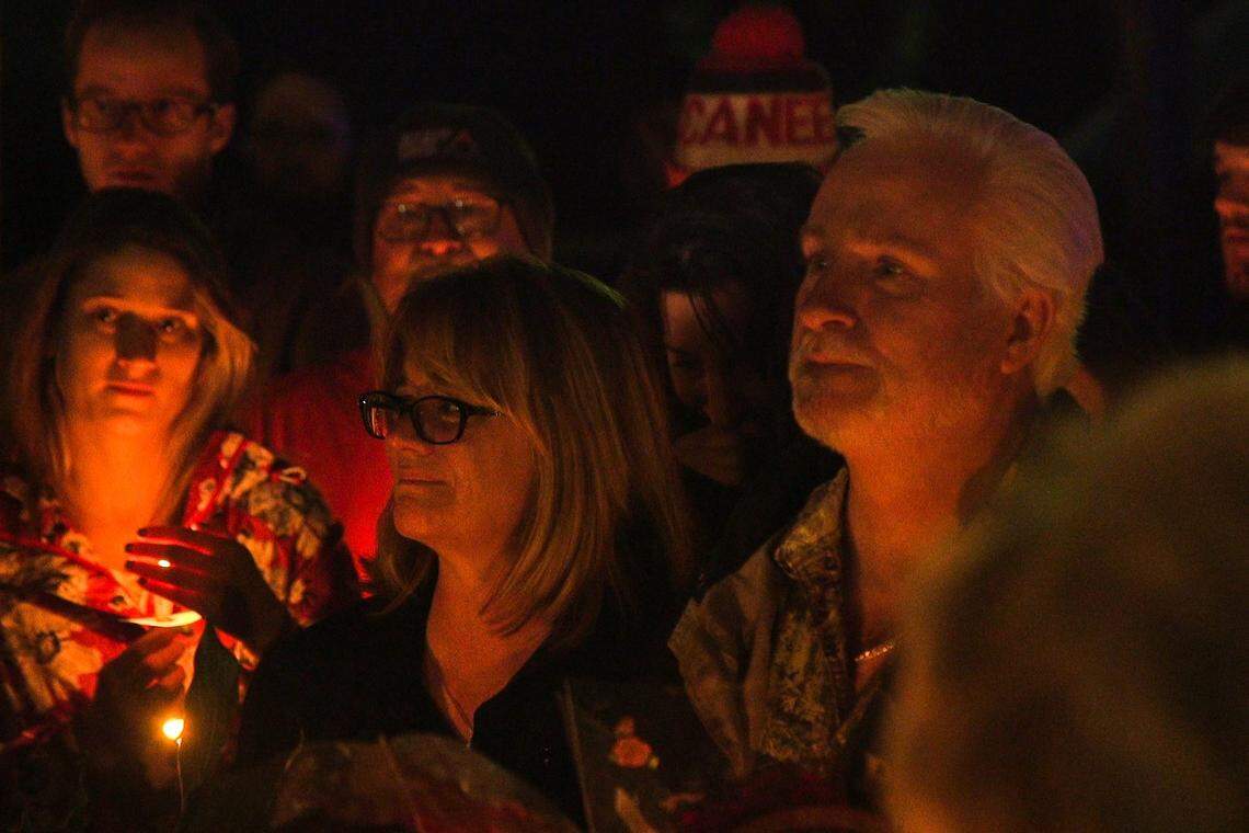 Scott Brooks’ twin brother David Brooks and families at the vigil.
