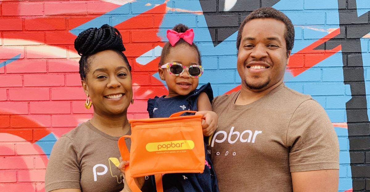 Clarence and Kia Lyons pose for a photo ahead of their opening of the Popbar location at Camp North End.