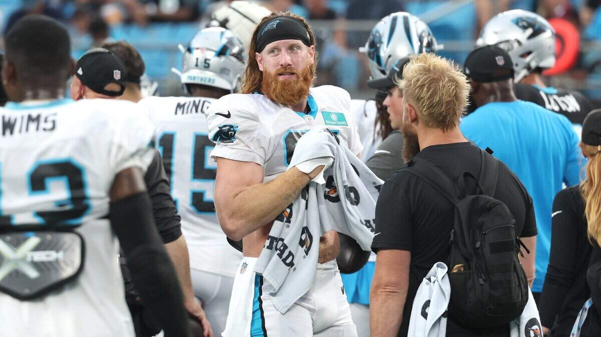 Carolina Panthers tight end Hayden Hurst, center, during the team’s Fan Fest practice at Bank of America Stadium on Wednesday, August 2, 2023.