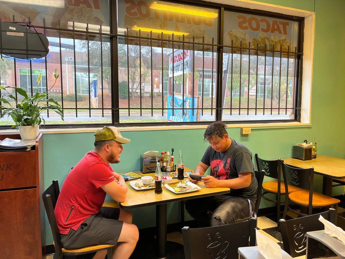 Diners enjoy a leisurely lunch at El Sazon Latino.
