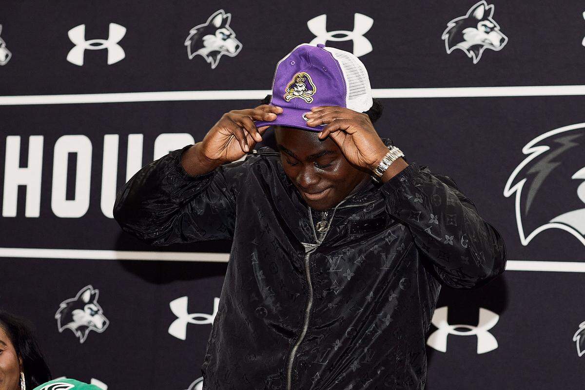 Hough High's LJ Porter, a top high school football recruit in North Carolina, announces his college decision to East Carolina at Hough High School in Cornelius, NC.
