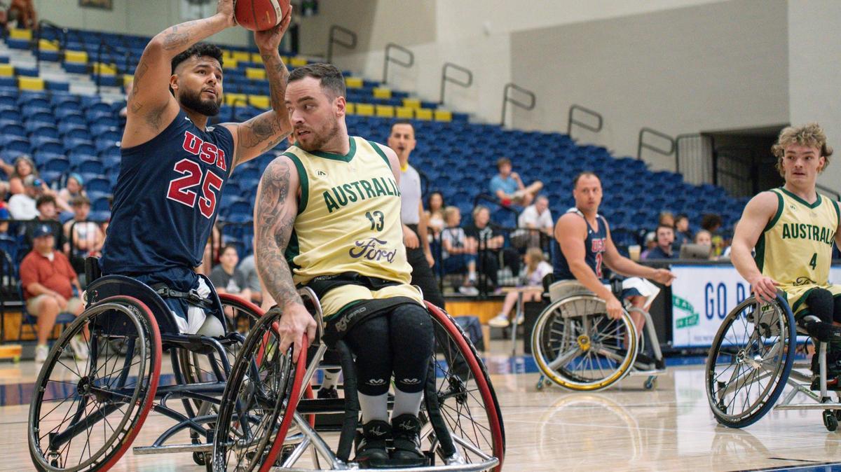 George Salazar of Team USA attempts a shot during the Paralympic Wheelchair Basketball exhibition game on June 6, 2024, in the Queens University basketball gym.