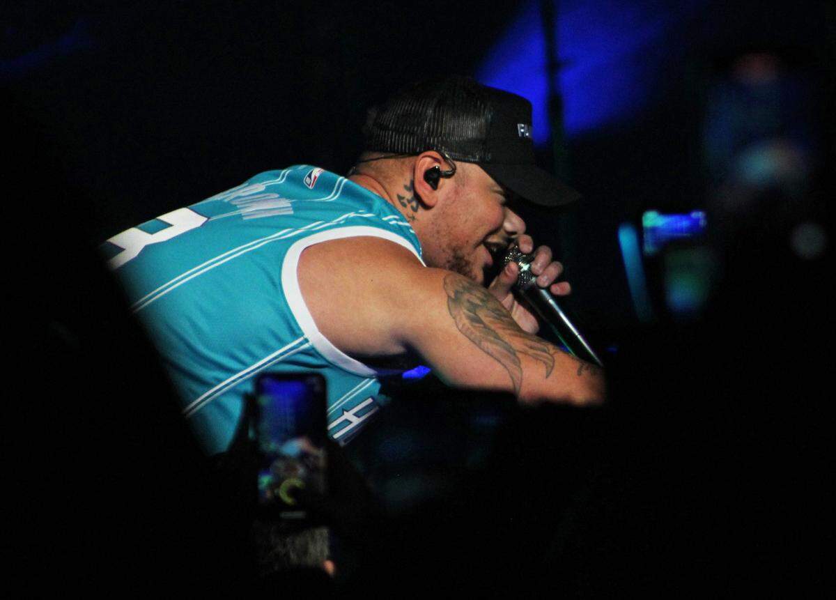 Kane Brown performing at the Spectrum Arena in Charlotte, NC on December 4, 2021.