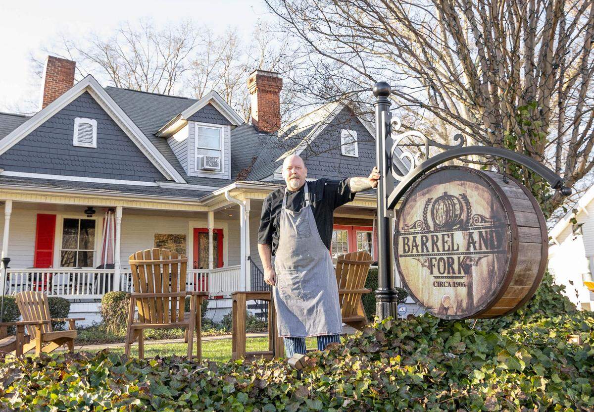 Barrel & Fork chef Eric Litaker poses outside of the Cornelius restaurant. Southern Fork Restaurant Group is also opening Savannah Oyster Co. in Mooresville.