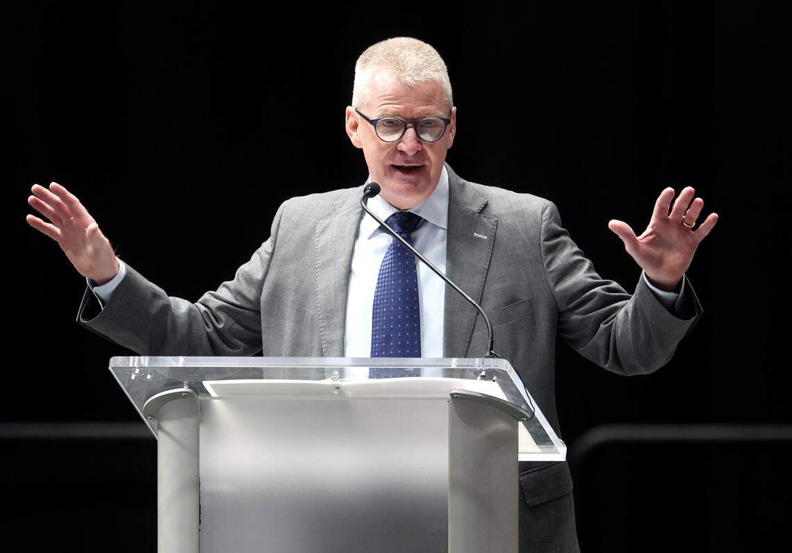 Former NASCAR driver Jeff Burton speaks during a memorial service Friday morning at Bojangles Coliseum in Charlotte. The ceremony was held to honor the lives lost in the Dec. 18, 2025 plane crash in Statesville that included former NASCAR driver Greg Biffle. 
