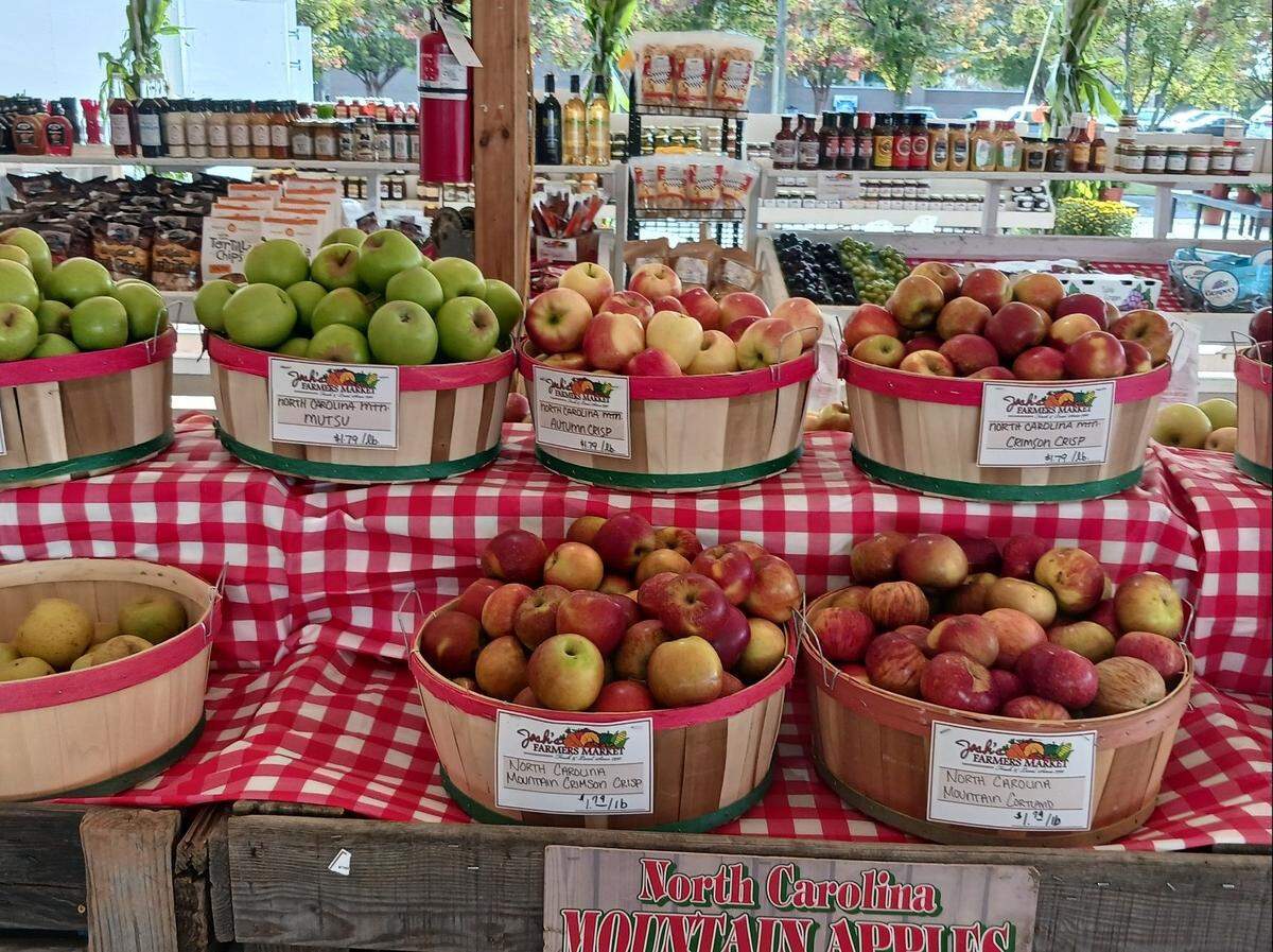 North Carolina apples await visitors at the new temporary location of Josh's Farmers Market on River Highway in Mooresville, NC., on Sept. 29, 2023.