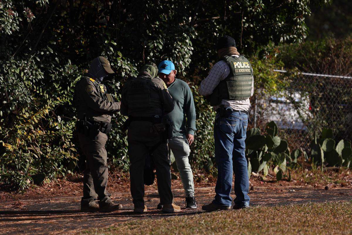 Border Patrol Agents check up on people on Sharonbrook Drive in Charlotte, NC on Sunday morning, Nov. 16, 2025.