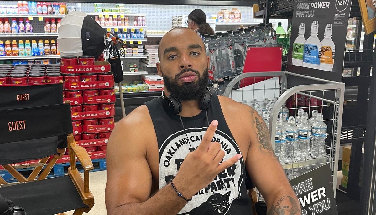 Jake Lawler poses on the set of “The Crossover.”