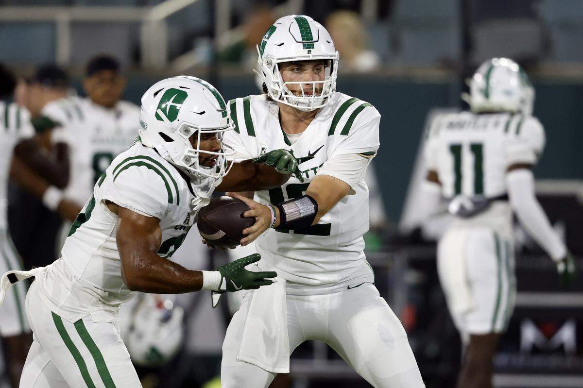 Charlotte 49ers quarterback Grayson Loftis (12) warms up prior to a game against the Tulane Green Wave at Yulman Stadium on Nov. 29, 2025 in New Orleans, Louisiana.