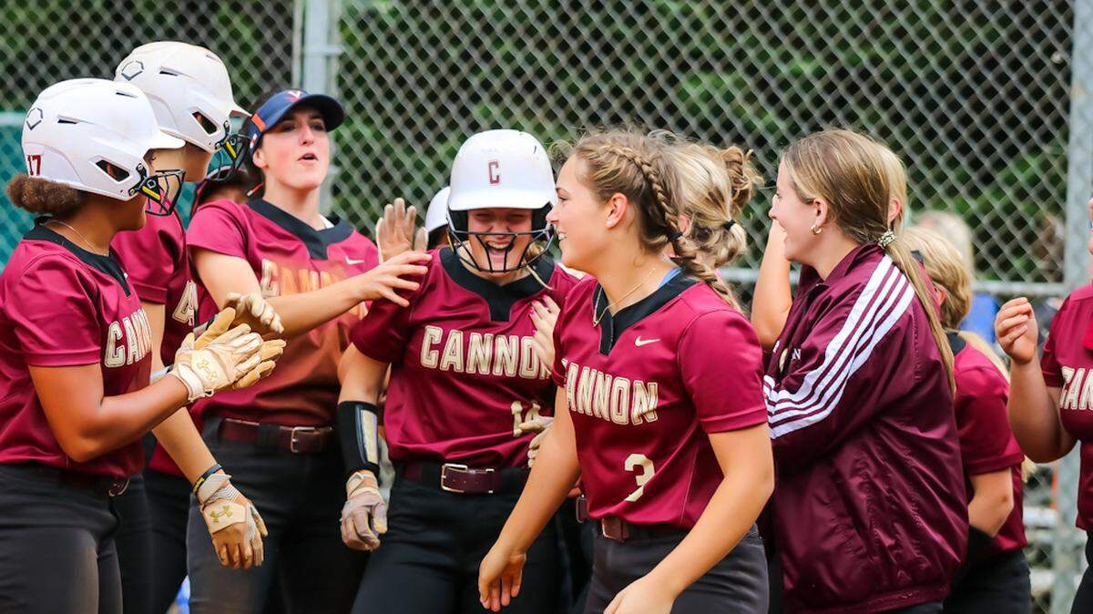 The Cannon Cougars celebrate their first win over Charlotte Christian in the first game of the state playoffs