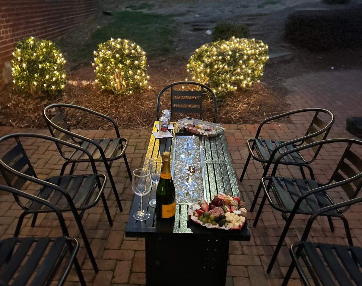 There’s a patio tucked between Table & Board and Habibi Lebanon where you can sit and eat food ordered from either spot — or The Crazy Pig just steps away.