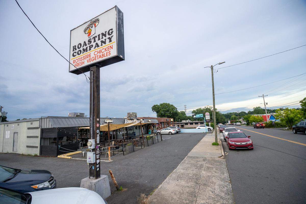 The Roasting Company sits next to Jeff’s Bucket Shop on Montford Drive in Charlotte.