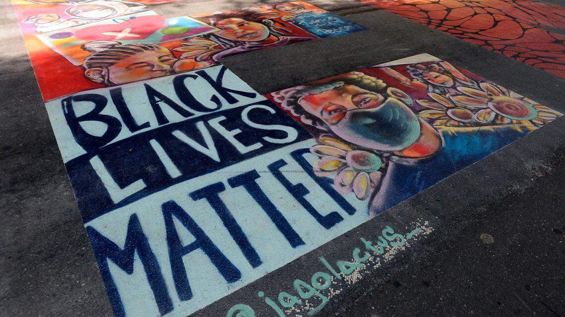 One piece of a larger Black Lives Matter mural painted on the 200 block of South Tryon Street on Friday, July 10, 2020.