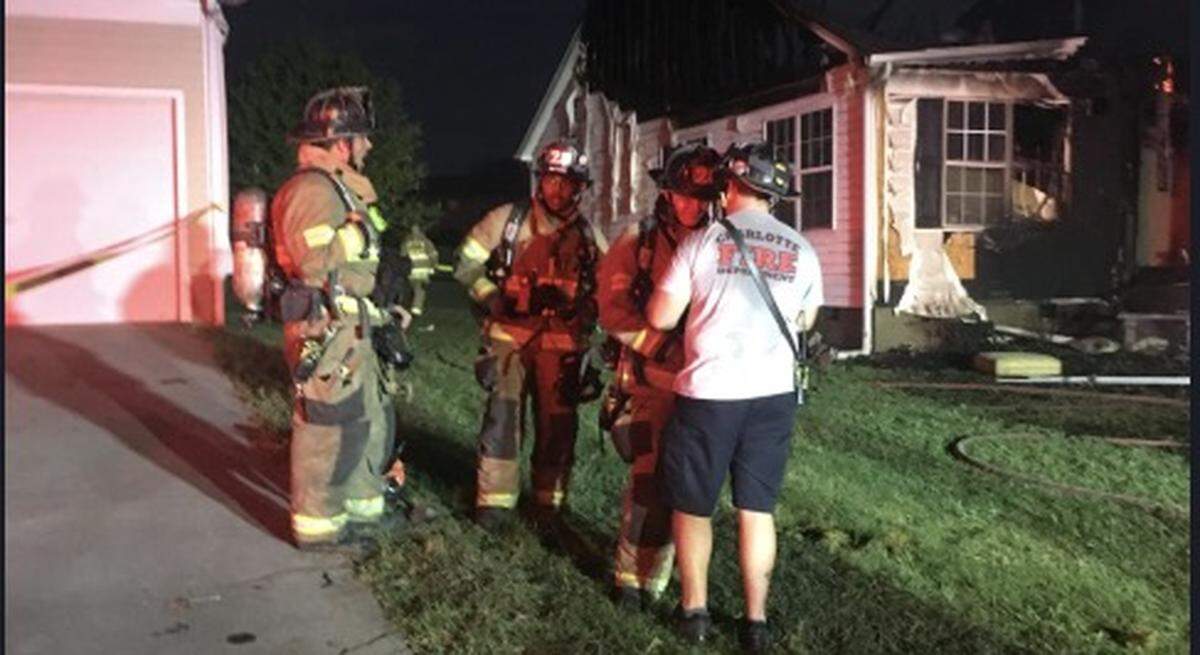 Charlotte Fire Department responds to large house fire.