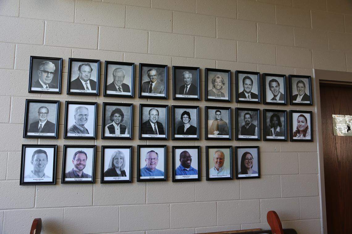 The gallery of past ministers at Matthews United Methodist Church - or “The Faces of Spiritual Leadership,” as a nearby plaque puts it - is a record “of nearly 150 years of the life and ministry of this church,” said current Pastor Chuck Wilson. In August, he removed the photo of former pastor Lane Hurley at the request of Hurley’s daughters.