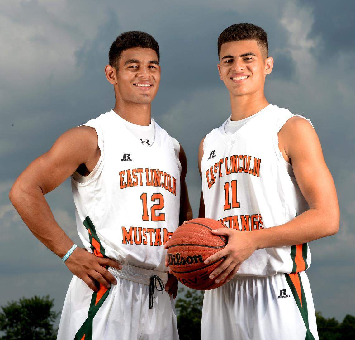 Chazz Surratt, left, and his brother, Sage, concentrated exclusively on football in college. But in high school at East Lincoln, they also teamed together in basketball.
