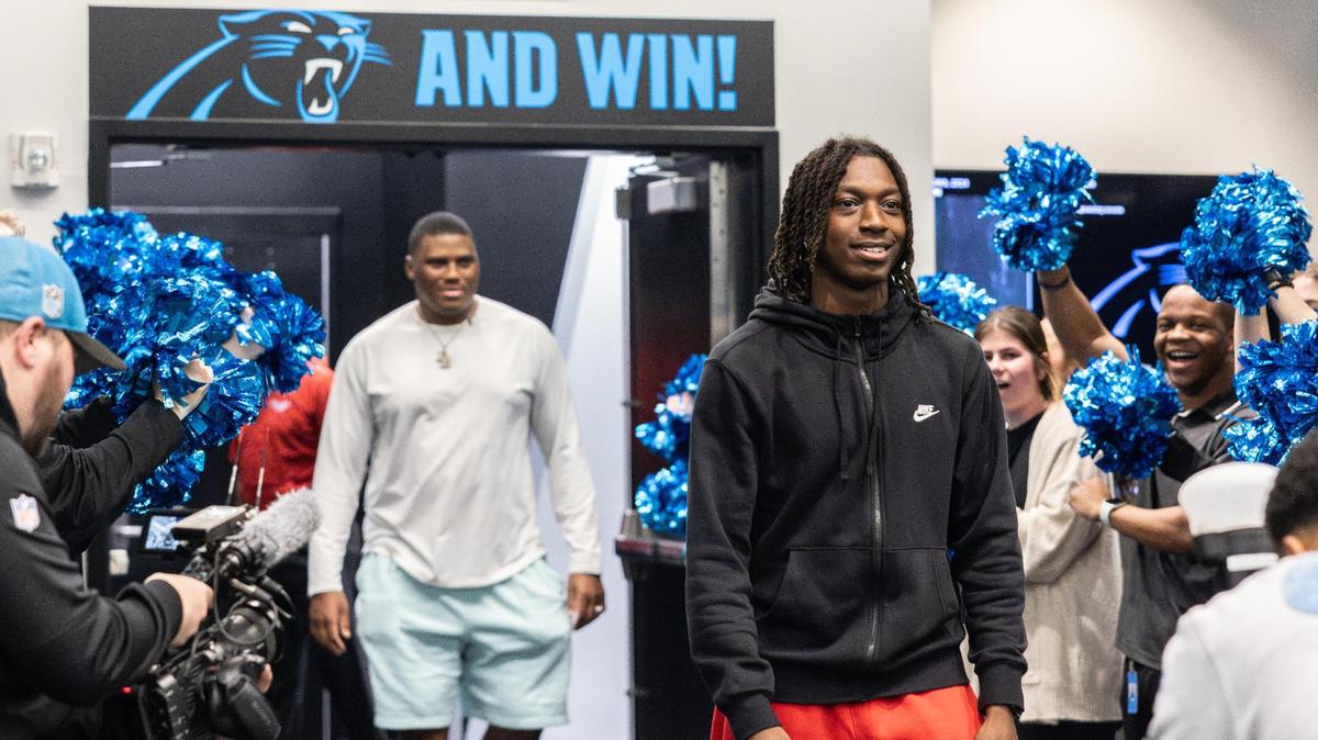 Carolina Panthers DL Derrick Brown surprises Monroe High football star Jordan Young with an invitation to Nike’s “The Next Ones” camp in the locker room at the Bank Of America Stadium in Charlotte, N.C., on Friday, January 26, 2024.
