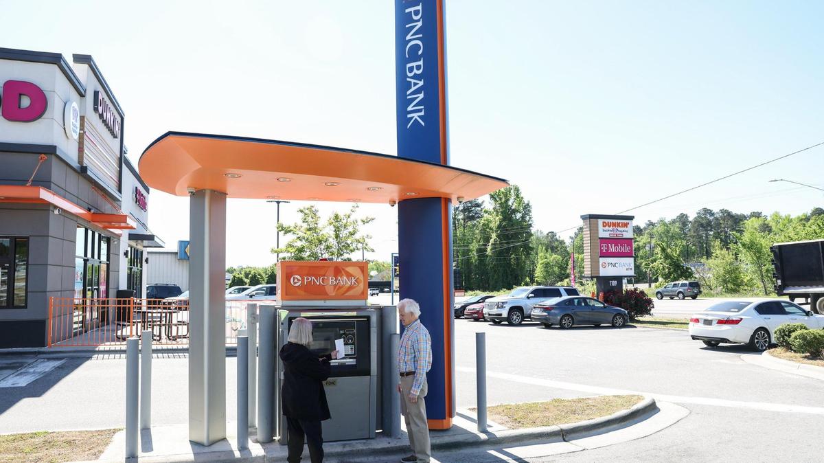 PNC Bank is planning an expansion in Waxhaw, according to the company. In this file photo, Carol Gibson, left, and her husband Carl Gibson deposit business checks at a PNC Bank ATM off of Highway 74 in Wadesboro.