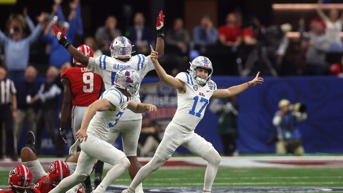 NEW ORLEANS, LOUISIANA - JANUARY 01: Lucas Carneiro #17 of the Ole Miss Rebels celebrates a field goal during the fourth quarter against the Georgia Bulldogs during the 2025 College Football Playoff Quarterfinal at the Allstate Sugar Bowl at Caesars Superdome on January 01, 2026 in New Orleans, Louisiana. (Photo by Chris Graythen/Getty Images)