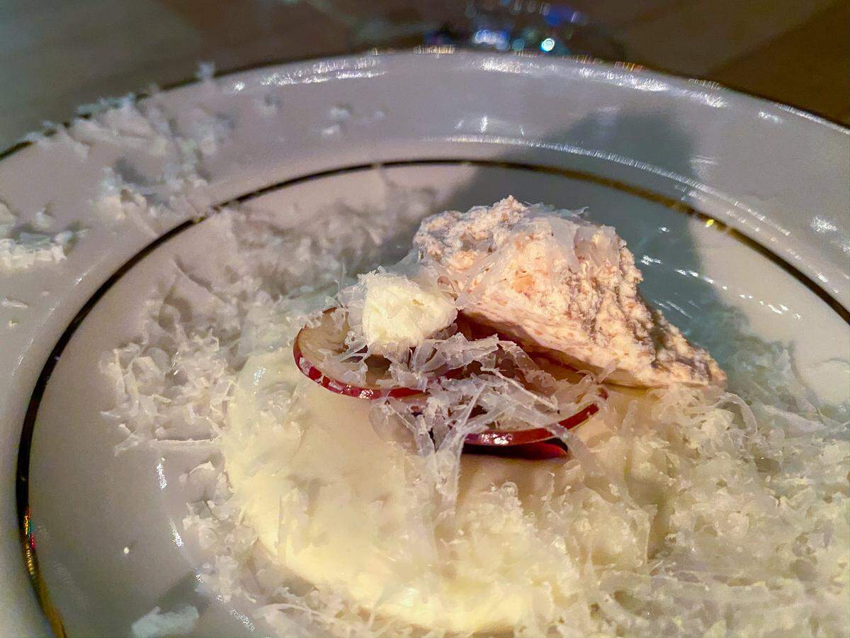 Whipped Gluten Cream, 2 Year Parm, Concord Grape Gummie, Champagne Jelly, Peanut Crumble, Fresh Grape at a recent Anomaly pop-up dinner.