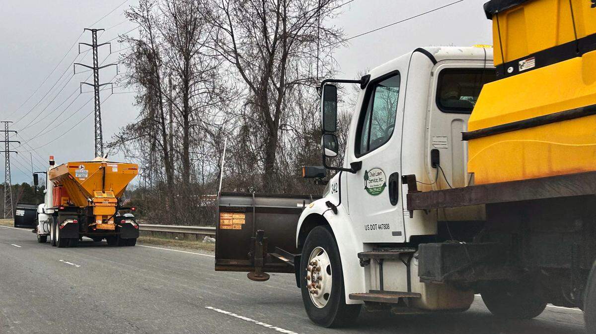 Snow plows ride along Highway NC 16 in preparation for snow that has been forecasted in the Charlotte area on Wednesday, February 19, 2025.