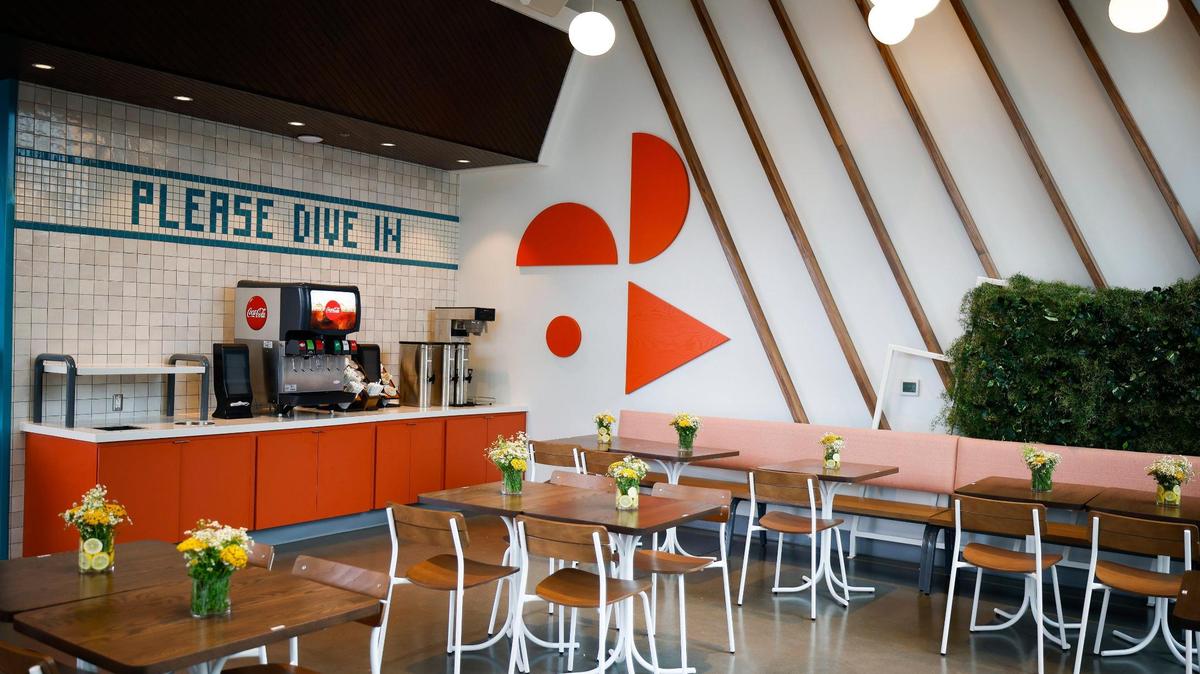 Summerbird’s dining room facing South Tryon Street plays off the summer theme at the new fast-casual restaurant in CHarlotte’s South End.