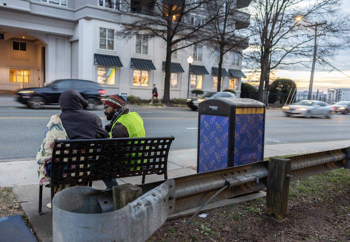 Jeet Pawar, right, surveys an unhoused person during the 2026 Point-in-Time Count in Charlotte, N.C., on Thursday, January 22, 2026.