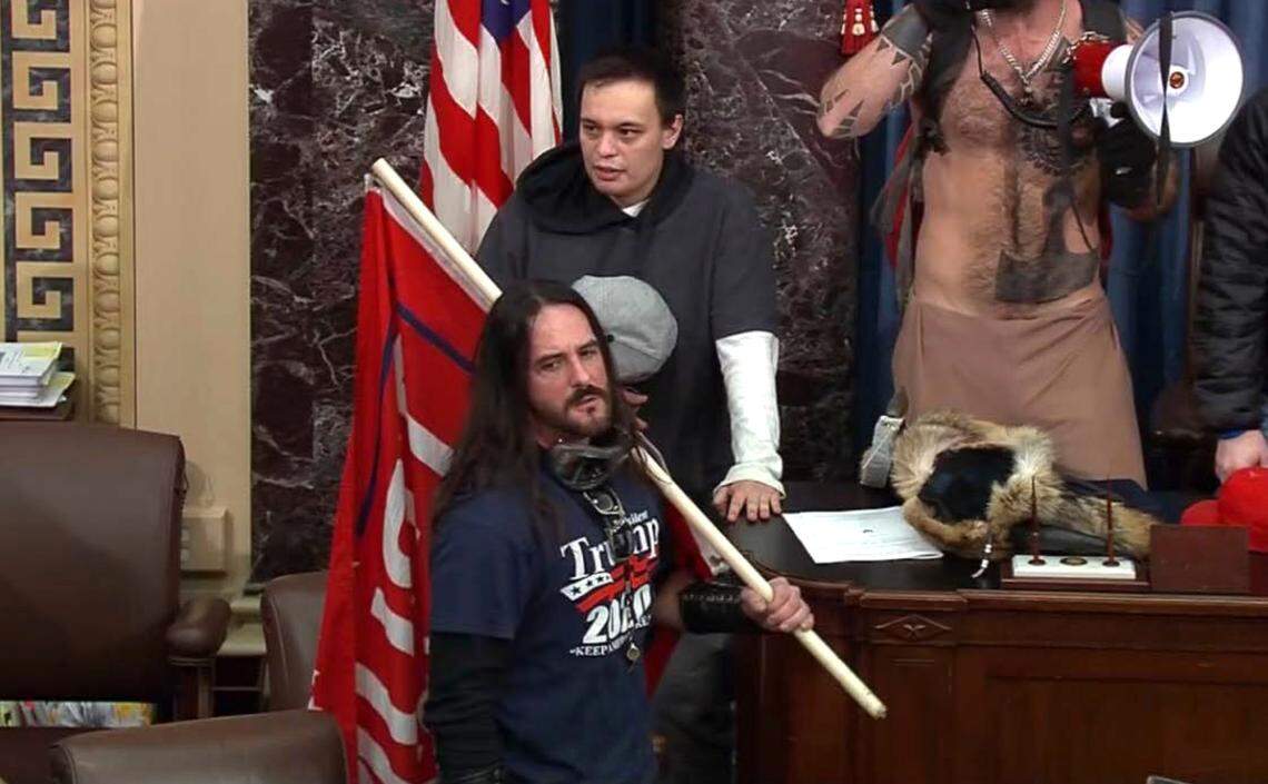 Video from U.S. Capitol Police showed Paul Hodgkins of Tampa, Fla., carrying a Trump flag on the floor of the U.S. Senate during the Jan. 6 assault on the Capitol. He pleaded guilty to a felony charge in June, and on Monday, July 19, 2021, he was sentenced to eight months in prison.