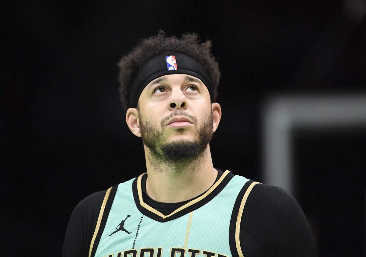 Charlotte Hornets guard Seth Curry (30) looks up at the score board in a time out during the first half against the Chicago Bulls at the Spectrum Center.
