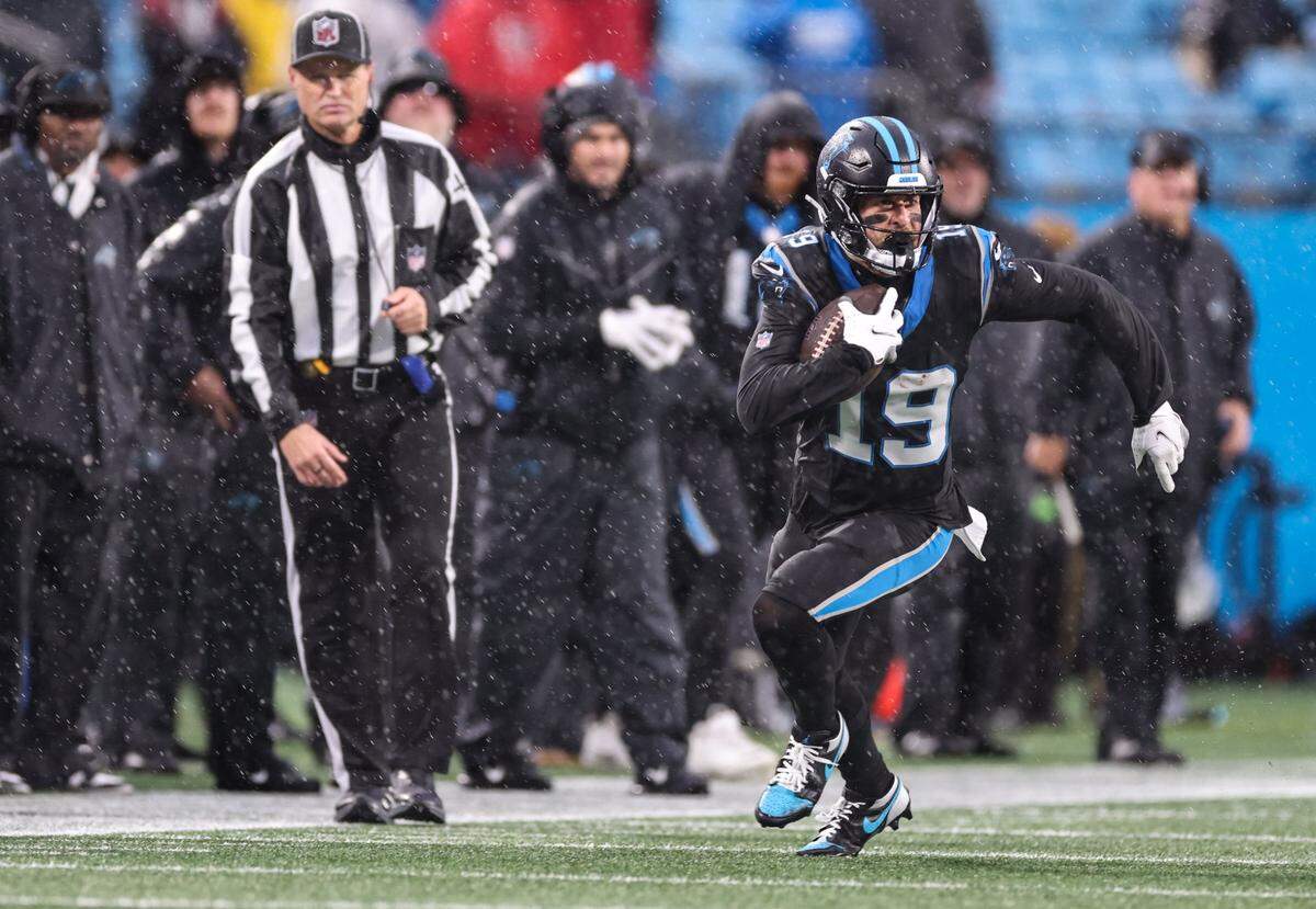 Carolina Panthers wide receiver Adam Thielen runs the ball against the Atlanta Falcons at the Bank of America Stadium in Charlotte, N.C., on Sunday, December 17, 2023.