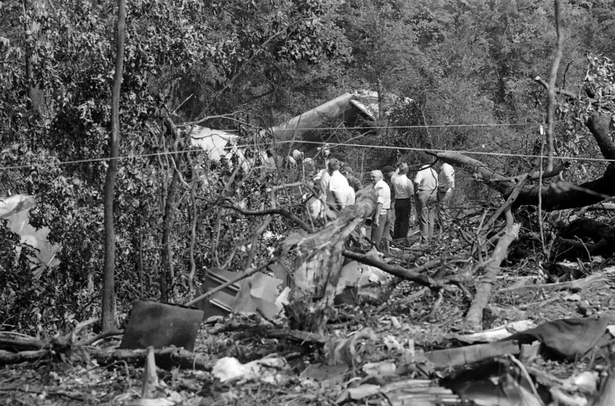 Firefighters on the scene of the Eastern Airlines Flight 212 crash on Sept. 11, 1974.