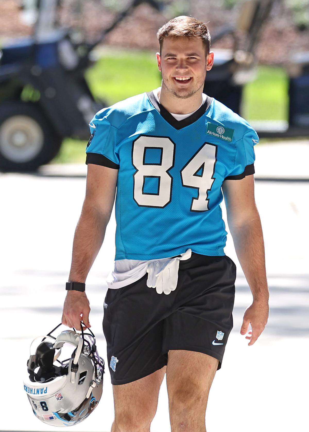 Carolina Panthers rookie tight end Mitchell Evans walks to the team’s rookie minicamp practice on Friday, May 9, 2025.
