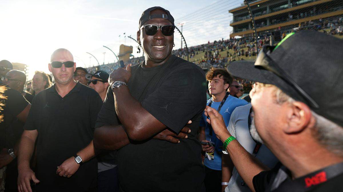 Oct 27, 2024; Homestead, Florida, USA; 23XI owner Michael Jordan celebrates after his driver NASCAR Cup Series driver Tyler Reddick (not pictured) won the Straight Talk Wireless 400 at Homestead-Miami Speedway.