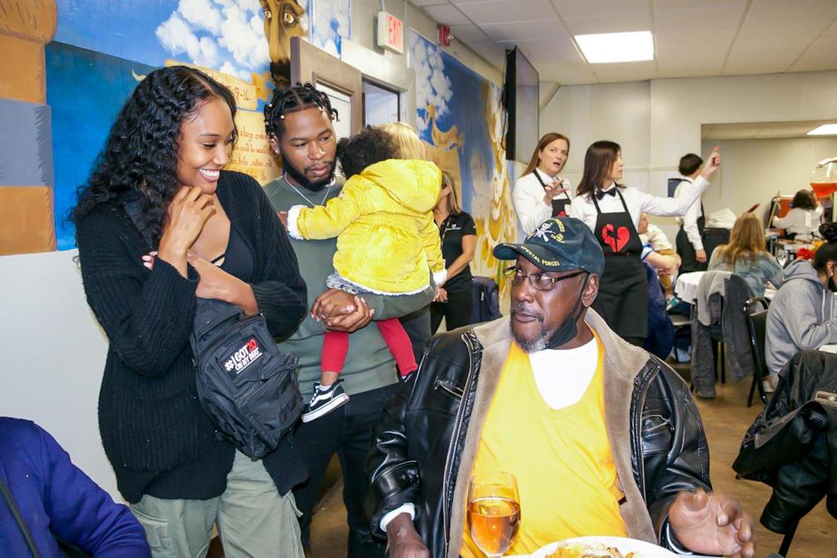Celebrity Producer20 and International Cover Model Tara Nichole and family spread holiday joy at the Charlotte Rescue Mission Thanksgiving Dinner
