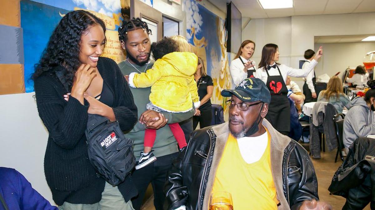 Celebrity Producer20 and International Cover Model Tara Nichole and family spread holiday joy at the Charlotte Rescue Mission Thanksgiving Dinner