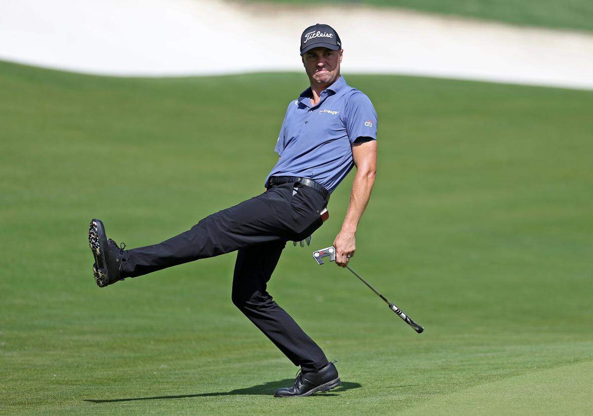 Justin Thomas tries to help his ball toward the cup on the 15th green during second round action of the Wells Fargo Championship at Quail Hollow Club in Charlotte on Friday, May 10, 2024.