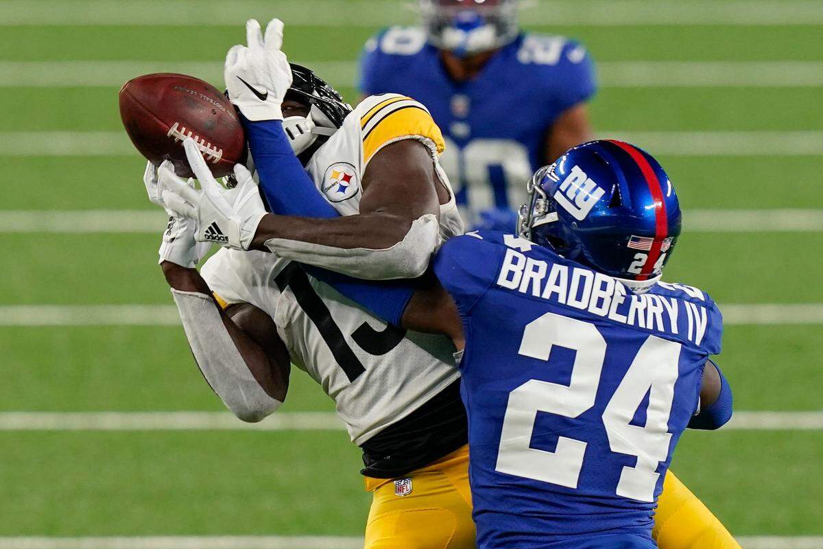 New York Giants cornerback James Bradberry (24) breaks up a pass intended for Pittsburgh wide receiver James Washington (13) on Sept. 14th. Bradberry spent his first four seasons with Carolina.