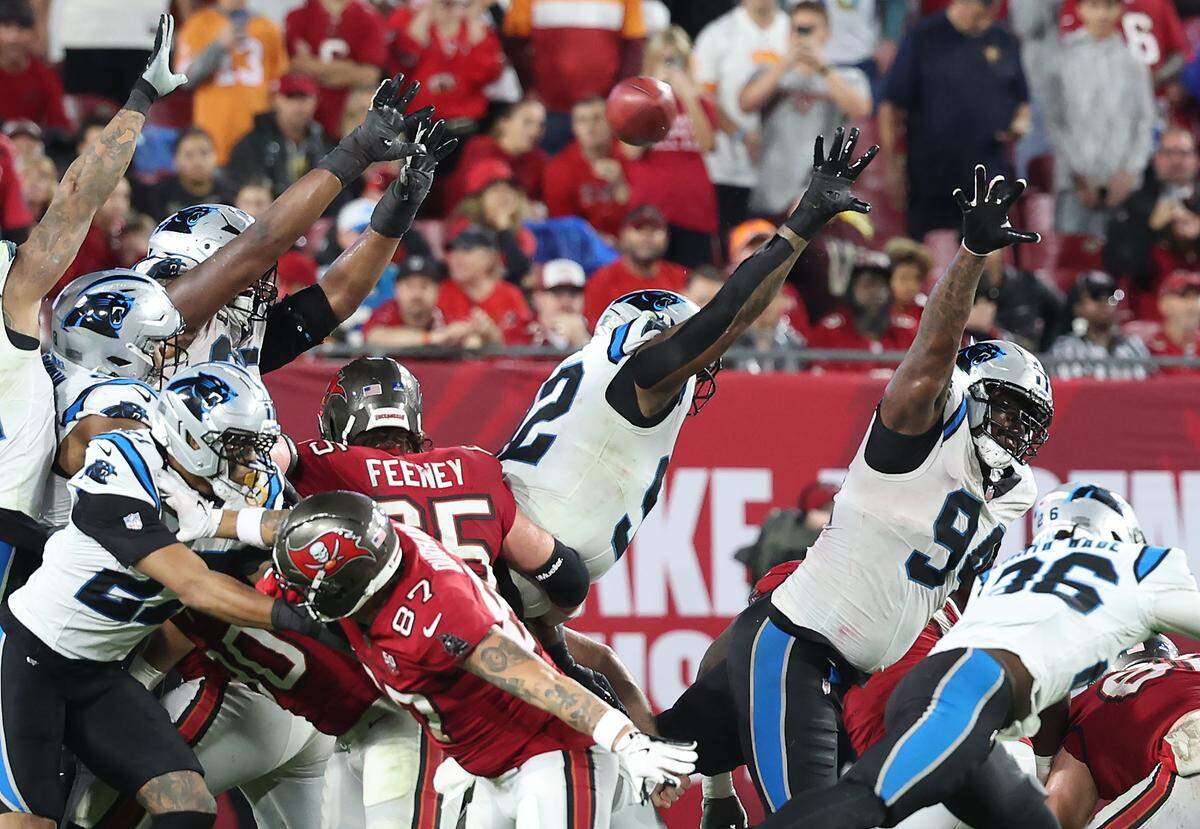 The Carolina Panthers line blocks a field goal attempt by Tampa Bay Buccaneers kicker Chase McLaughlin during action at Raymond James Stadium in Tampa, FL. on Saturday, January 3, 2026. The Buccaneers defeated the Panthers 16-14.