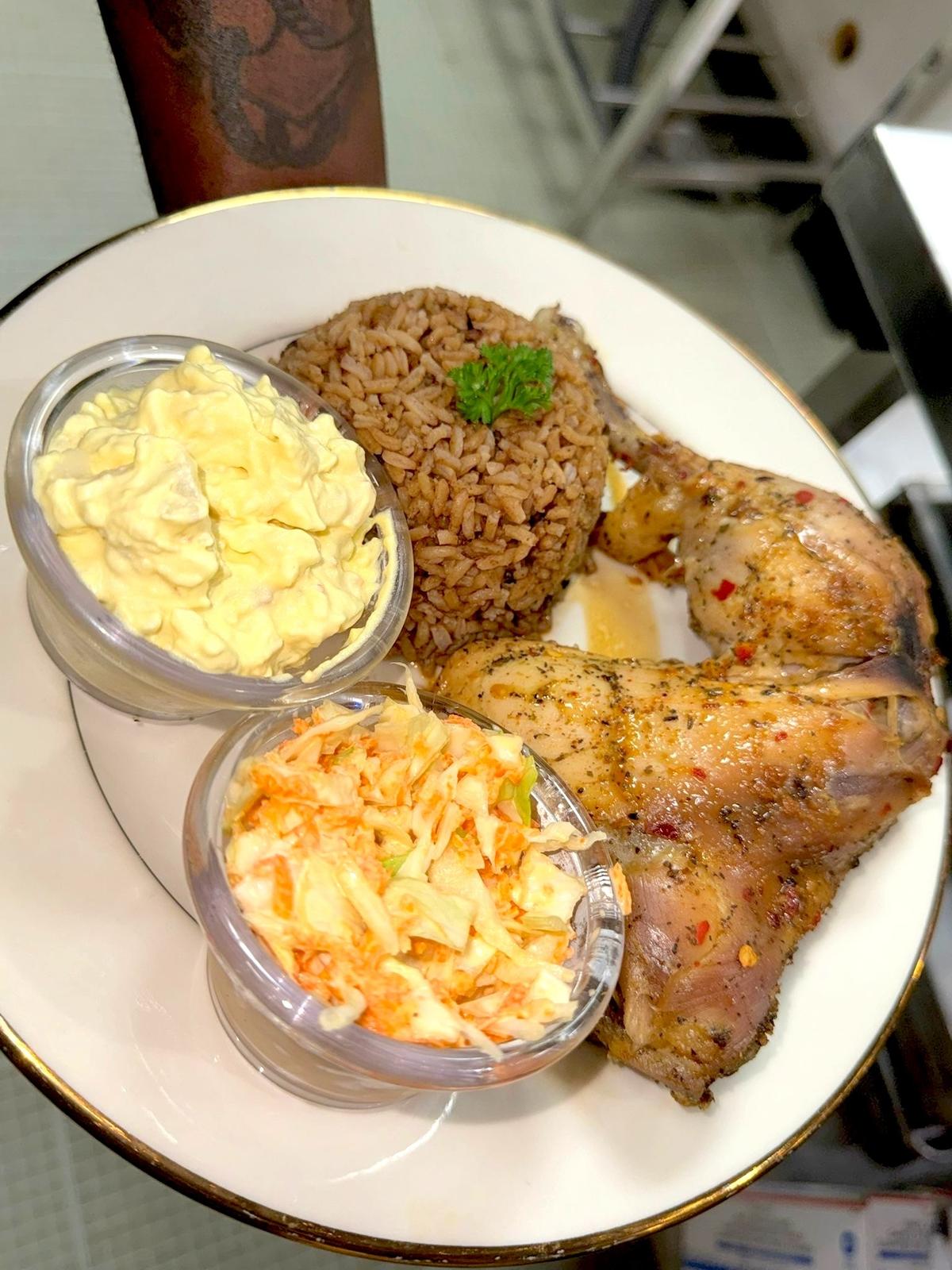 Brother Pay Bahamian Delight’s baked chicken dinner.