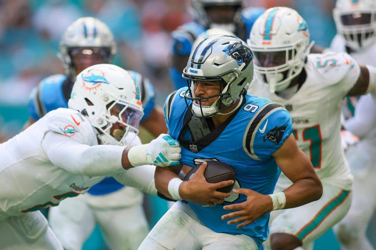 Carolina Panthers quarterback Bryce Young (9) is sacked by Miami Dolphins linebacker Bradley Chubb (2) during the fourth quarter at Hard Rock Stadium. 