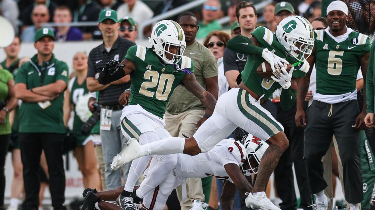 Charlotte defensive back Al-Ma’hi Ali, second from the right, intercepts a pass during the game against Gardner-Webb at Jerry Richardson Stadium in Charlotte, NC on Saturday, September 14, 2024.