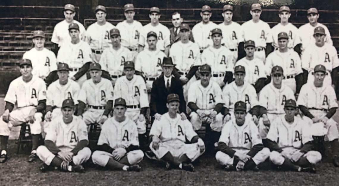 The 1942 Philadelphia Athletics featured future Hall of Fame manager Connie Mack (middle, in suit).