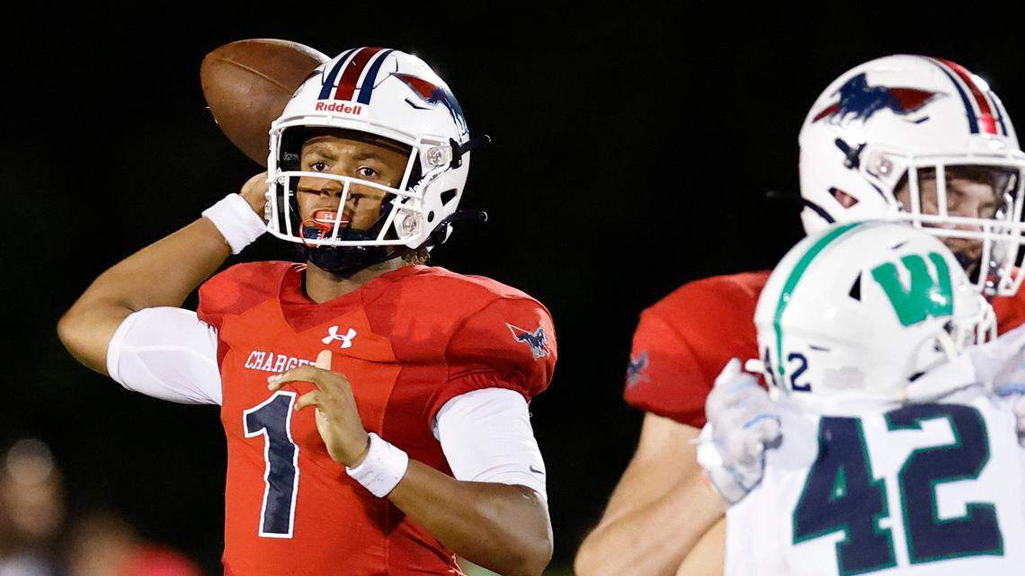 Providence Day’s Jadyn Davis (1) passes the ball over Weddington defense during a game at Providence Day in Charlotte, N.C., Friday, Aug. 26, 2022.