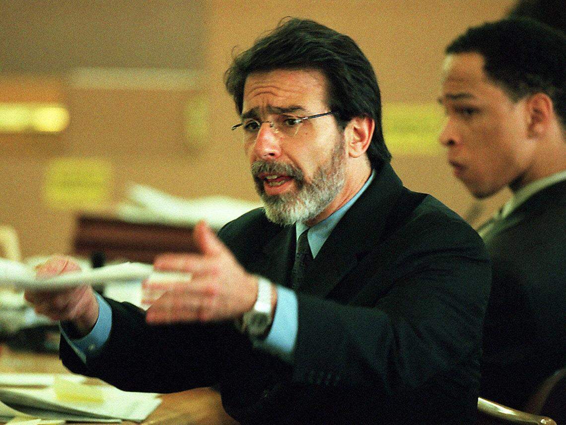 Defense attorney David Rudolf (left) ultimately decided not to put murder defendant Rae Carruth (right) on the stand, partially over concerns about opening his client to cross-examination.