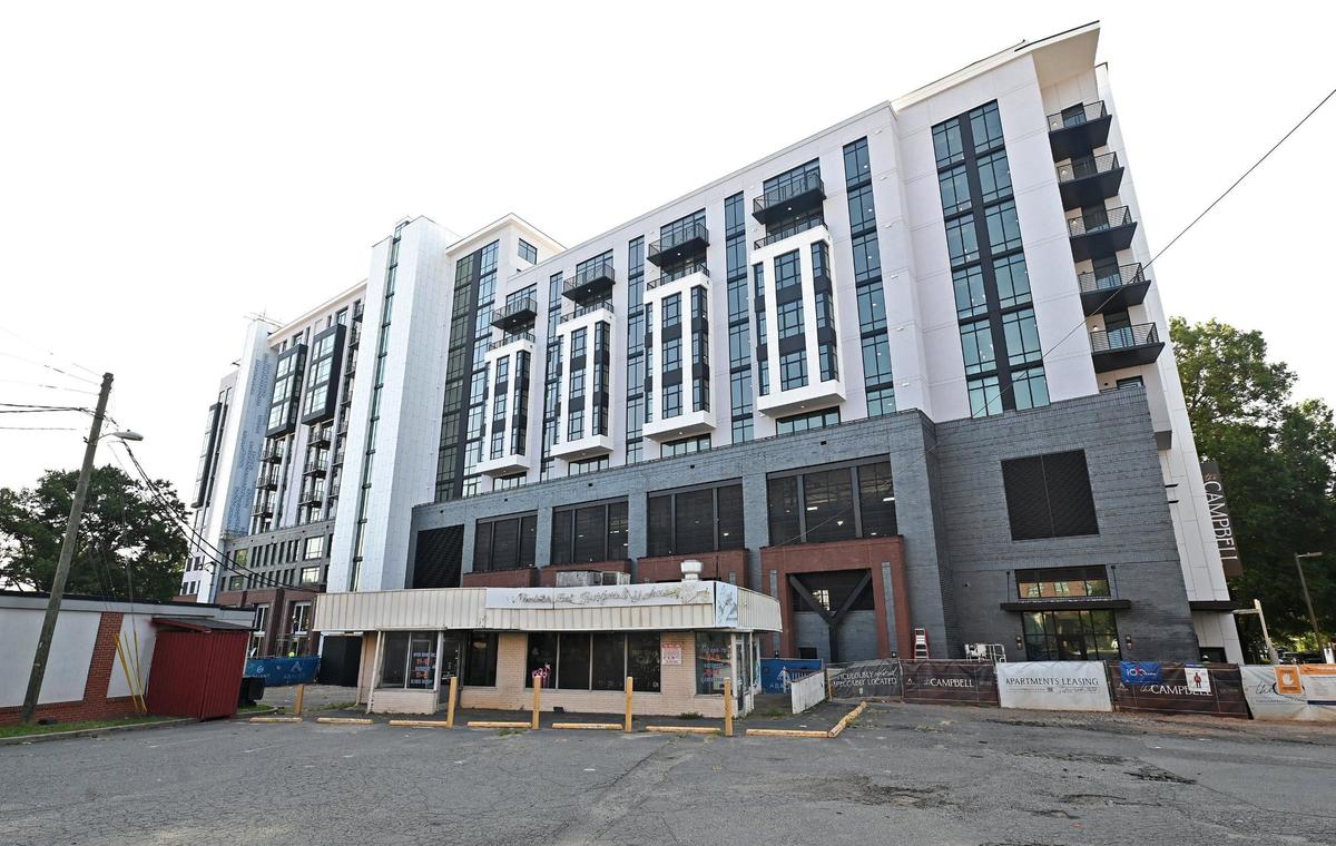 The Campbell a new apartment is being built where a beloved local business, Campbell’s Greenhouse and Nursery used to be located located on McDonald Avenue in Charlotte, NC.