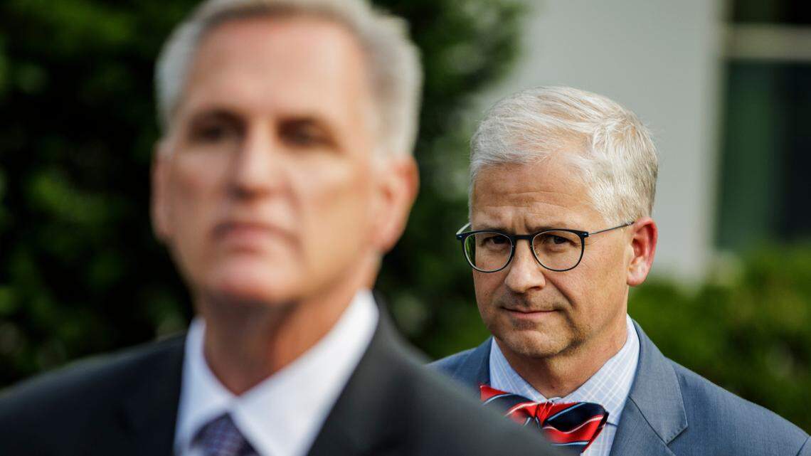 Representative Patrick McHenry, a Republican from North Carolina, listens as Speaker of the House Kevin McCarthy speaks during a press conference in front of the West Wing at the White House on May 22, 2023 in Washington, D.C. McCarthy met with President Joe Biden in the Oval Office today as the June 1st deadline for increasing the Debt Ceiling approaches.